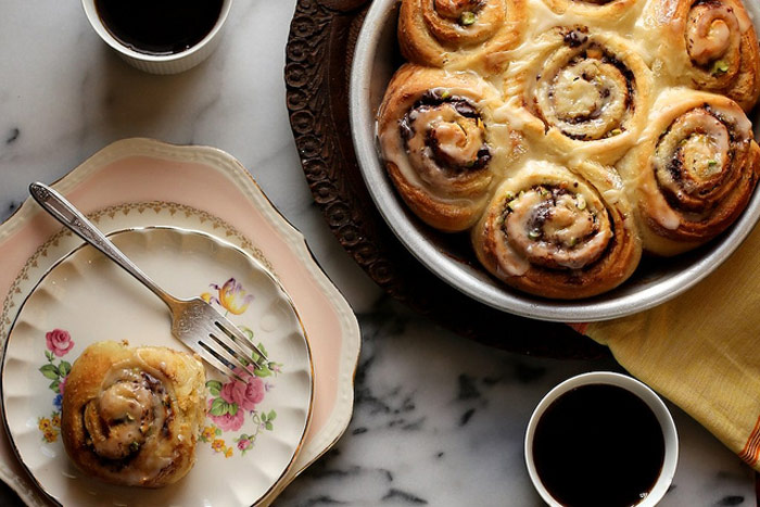 Pistachio, Orange, and Dark Chocolate Cinnamon Rolls